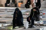 غبار روبی و عطر افشانی مزار مطهر شهدا بمناسبت هفته ی دفاع مقدس- تبریز
