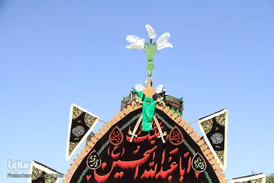 ⁨نخل‌گردانی در محله و حسینیه فهادان یزد⁩