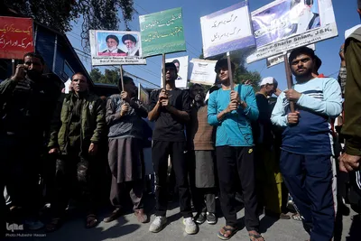 Kashmiri Muslims hold placards as they chant slogans against Israel and the U.S. during a protest against Israel's military operations in Gaza, on October 13, 2023, in Budgam, west of Srinagar, Indian-administered Kashmir, India. (Photo by Mubashir Hassan, IQNA)