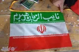 عکس | خدمت‌رسانی هنرمندان خطاط به زائران اربعین در مرز خسروی