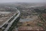 تصاویر هوایی از رودخانه کارون و منطقه سیل‌زده بامدژ