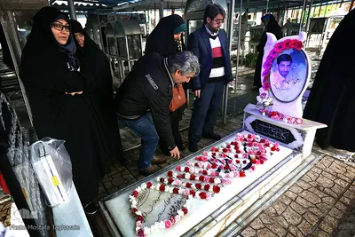 غبار روبی و عطر افشانی مزار مطهر شهدا