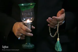 آیین سنتی شمع گردانی در حرم حضرت معصومه(س)