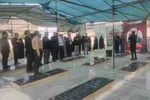 غبارروبی قبور شهدای جنگ تحمیلی 12 روزه توسط اعضای جهاد دانشگاهی لرستان