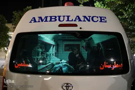 وداع پدر با کودک شهید حادثه تروریستی حرم شاهچراغ
