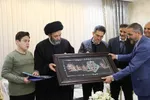 دیدار آیت‌الله عاملی با قهرمان مسابقات بین‌المللی قرآن