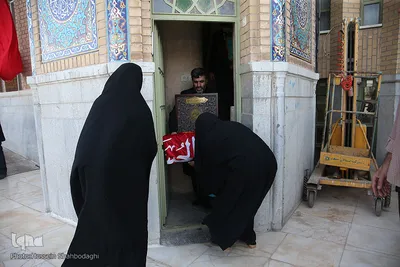 آئین شستشو وتعویض پرچم گنبد مسجد مقدس جمکران