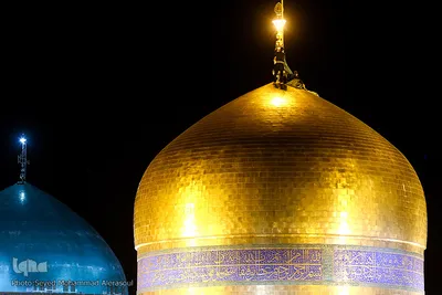 تعویض پرچم گنبد حرم امام رضا(ع)‎