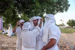 مراسم غسل تعمید منداییان در کنار رودخانه کارون