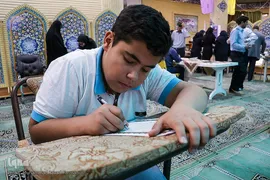 کتابت قرآن کریم در دانشگاه علوم پزشکی ایران 