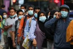 Malaysia’s Islamic Authorities Allow Use of Coronavirus Vaccine