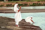 مراسم غسل تعمید منداییان در کنار رودخانه کارون