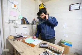 بازار گرم آجیل پزها در آستانه عید نوروز 