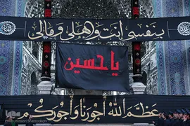⁨تعویض پرچم گنبد بارگاه حضرت معصومه(س)