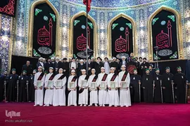 مراسم تعویض پرچم گنبد حرم حضرت اباالفضل العباس(ع) از قرمز به مشکی