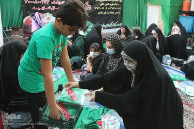 آغاز بسته‌بندی لباس همایش عظیم شیرخوارگان حسینی در استان فارس‎‎‎‎