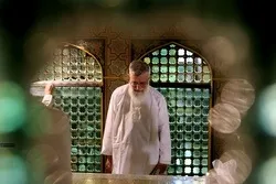 Leader Attends Dust Cleaning Ritual at Imam Reza (AS) Shrine on Eve of Muharram