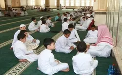 Quran tədris edən xristiyan müəllim