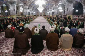 آیین تعویض پرچم گنبد حرم مطهر امام رضا(ع)