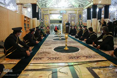 تعویض پرچم گنبد حرم رضوی در آغاز ماه محرم