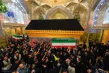 طواف پیکرهای خانواده رهبر شهید در حرم مطهر علوی