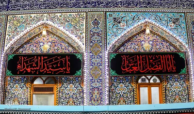 نصب پرچم های سیاه در آستان مقدس امام حسین(ع)