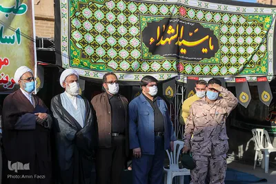 اهتزاز پرچم عزای اربعین در بین الحرمین شیراز