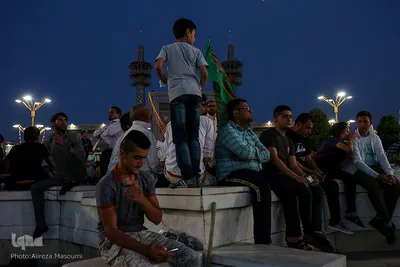 تعویض پرچم گنبد حرم امام رضا(ع)‎