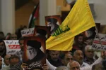 بزرگداشت شهادت سیدحسن نصرالله و عباس نیلفروشان در حرم شاهچراغ