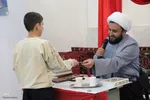 کرسی تلاوت قرآن در روستای آورزمان ملایر