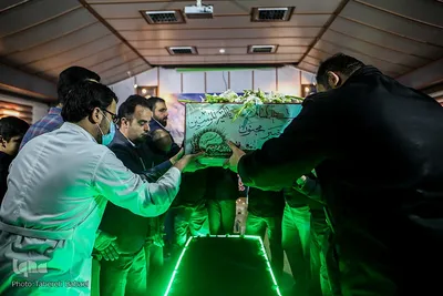 آیین وداع با پیکر شهید دفاع مقدس در بیمارستان نجمیه