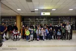 عکس کودکان مبتلا به سرطان و خانواده هایش در فرودگاه مشهد