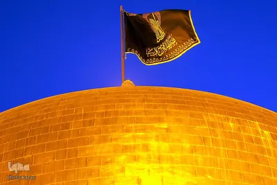 مراسم تعویض پرچم گنبد مطهر حرم امام رضا(علیه‌السلام)