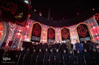 تعویض پرچم حرمین شریفین در کربلا به مناسبت فرارسیدن ماه محرم