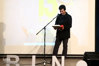 تجلیل از ۱۵ سال خدمات مرتضی فرج آبادی، سردبیر عکس خبرگزاری ایسنا در اختتامیه سیزدهمین جشنواره عکس دوربین نت