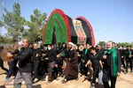 آیین نخل گردانی ظهر عاشورا در شاهدیه یزد