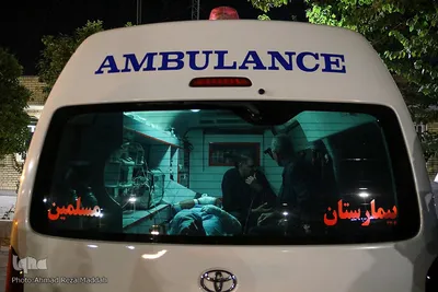 وداع پدر با کودک شهید حادثه تروریستی حرم شاهچراغ
