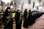 آیین تعویض پرچم گنبد حرم امام رضا(ع)
