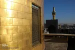 تعویض پرچم گنبد حرم امام رضا(ع)

