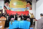مراسم تبرک از سنگ قبر امام حسین (ع) و پرچم ابوالفضل (ع)