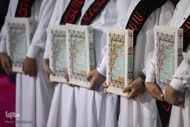 مراسم تعویض پرچم گنبد حرم حضرت اباالفضل العباس(ع) از قرمز به مشکی