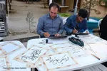 بداهه‌نويسی خوشنويسان شيرازی در جشن ميلادامام رضا(ع)
