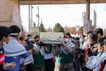 وداع دانش‌آموزان بیرجندی با شهدای گمنام