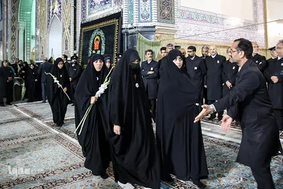 مراسم استقبال ازخانواده‌های شهدای شاهچراغ در مشهد مقدس