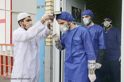 ضد عفونی معابر قم توسط نیرو های حشد الشعبی

