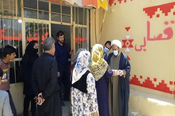 توزیع ۱۰۰۰ بسته گوشت قربانی از محل موقوفات کردستان + عکس