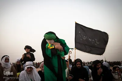 آیین نمادین خاکسپاری پیکرهای شهدای کربلا در حمیدیه