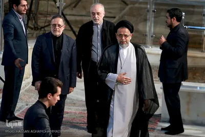 محمود علوی، وزیر اطلاعات، علی اکبر صالحی، رییس سازمان انرژی اتمی و ولی‌الله سیف، رییس بانک مرکزی در مراسم بیست و نهمین سالگرد ارتحال امام خمینی (ره)