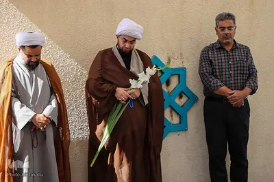 غبار روبی گلزارشهداء همزمان باآغاز هفته دفاع مقدس در ملایر‎