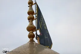 آیین تعویض پرچم گنبد حرم حضرت معصومه(س)